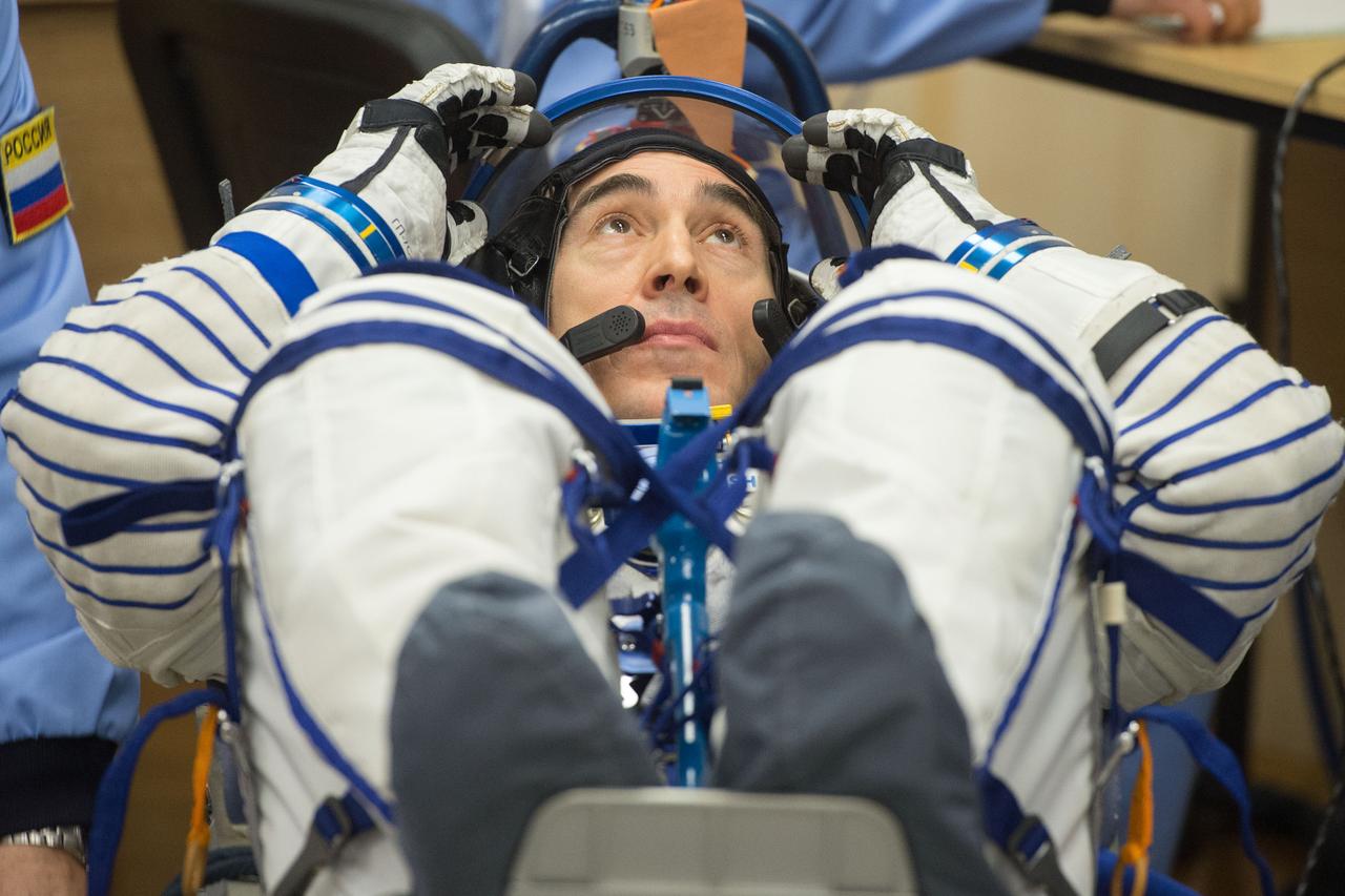 jsc2020e017088 - Expedition 63 Preflight - Expedition 63 crewmember Anatoly Ivanishin of Roscosmos has his Sokol suit pressure checked ahead of his launch on a Soyuz rocket with Ivan Vagner of Roscosmos, and Chris Cassidy of NASA, Thursday, April 9, 2020 at the Baikonur Cosmodrome in Kazakhstan. A few hours later, they lifted off for a six-and-a-half month mission on the International Space Station. Photo Credit: (NASA/GCTC/Andrey Shelepin)