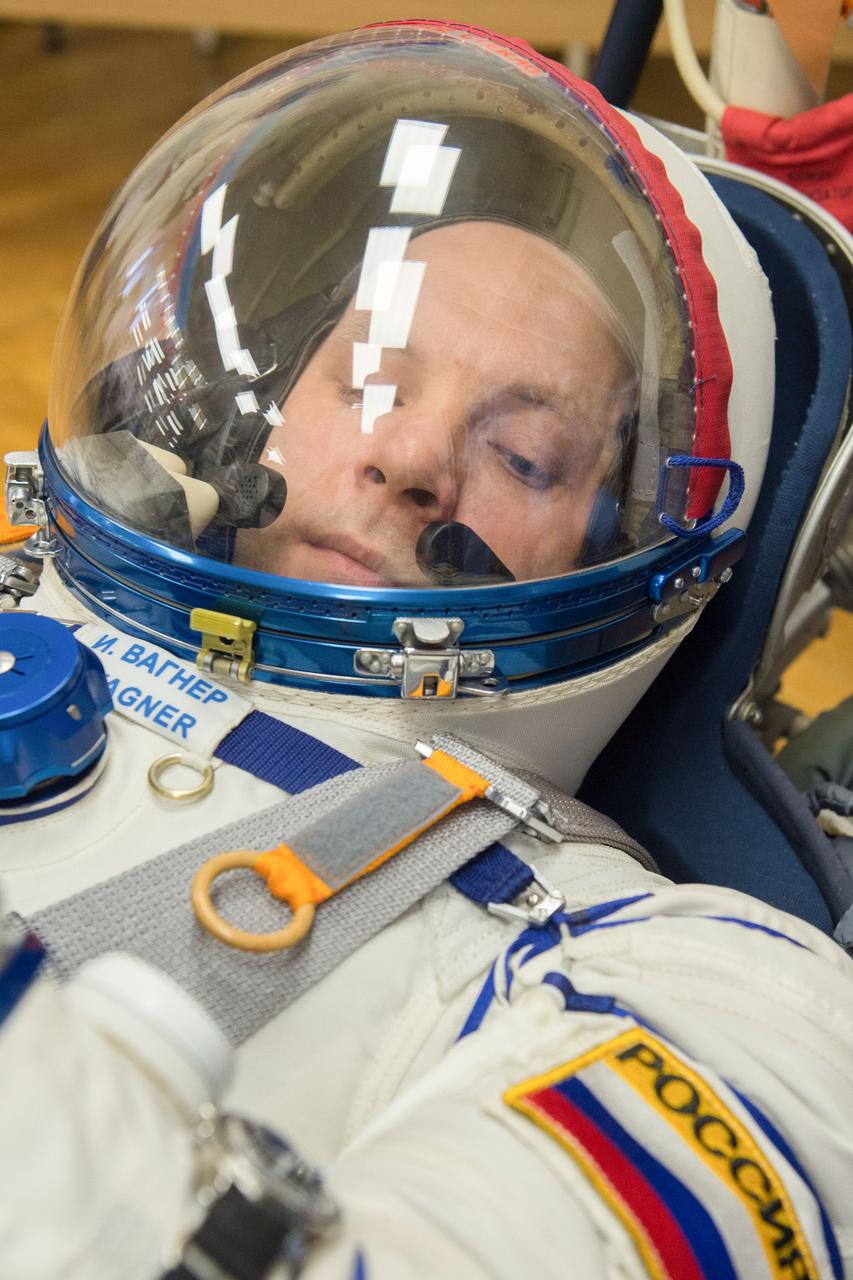 jsc2020e017091 - Expedition 63 Preflight - Expedition 63 crewmember Ivan Vagner of Roscosmos has his Sokol suit pressure checked ahead of his launch on a Soyuz rocket with Anatoly Ivanishin of Roscosmos, and Chris Cassidy of NASA, Thursday, April 9, 2020 at the Baikonur Cosmodrome in Kazakhstan. A few hours later, Vagner, Anatoly Ivanishin of Roscosmos, and Chris Cassidy of NASA lifted off for a six-and-a-half month mission on the International Space Station. Photo Credit: (NASA/GCTC/Andrey Shelepin)