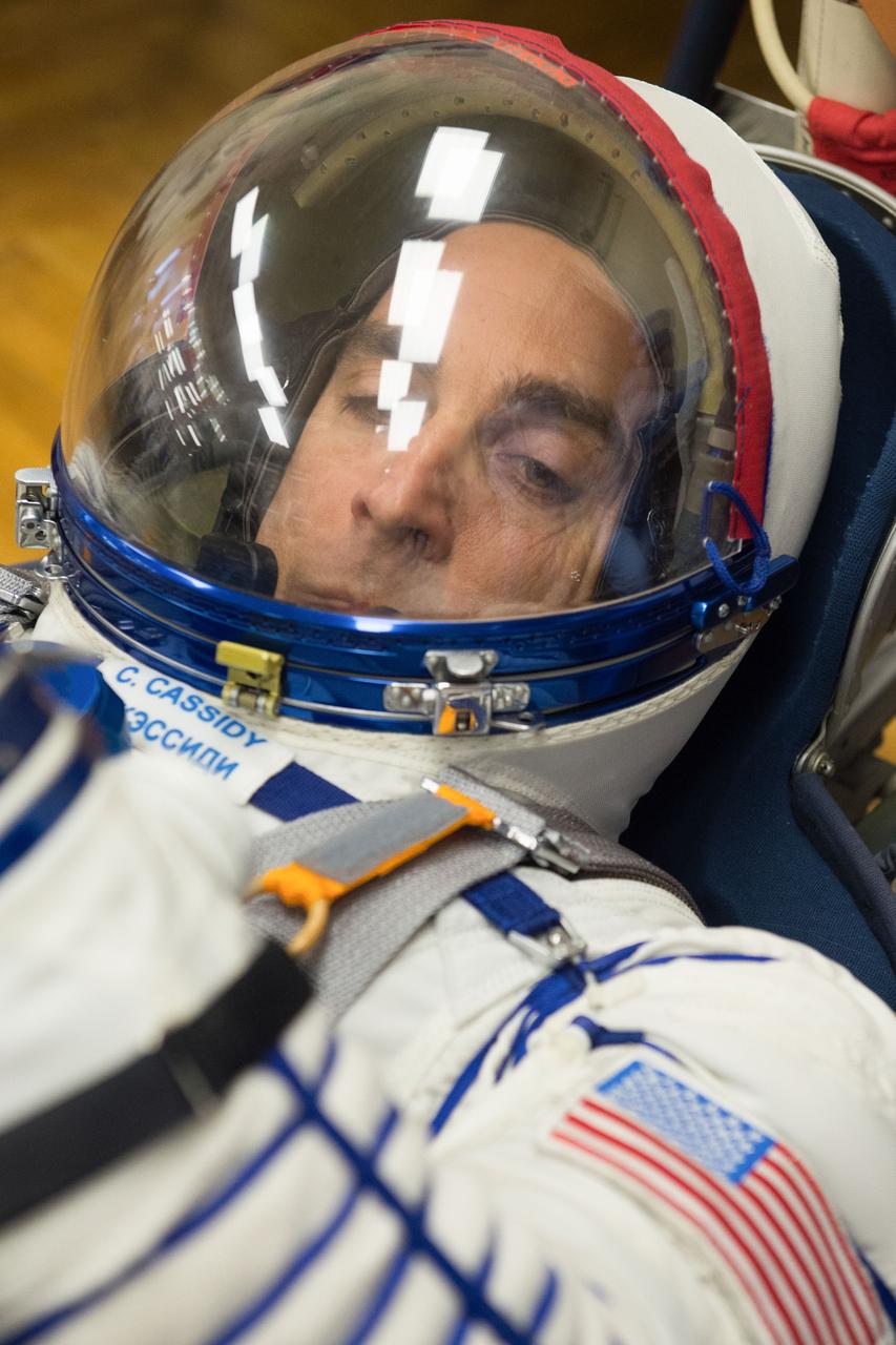 jsc2020e017097 - Expedition 63 Preflight - Expedition 63 crewmember Chris Cassidy of NASA has his Sokol suit pressure checked ahead of his launch on a Soyuz rocket with Anatoly Ivanishin and Ivan Vagner of Roscosmos, Thursday, April 9, 2020 at the Baikonur Cosmodrome in Kazakhstan. A few hours later, Vagner, Anatoly Ivanishin of Roscosmos, and Chris Cassidy of NASA lifted off for a six-and-a-half month mission on the International Space Station. Photo Credit: (NASA/GCTC/Andrey Shelepin)