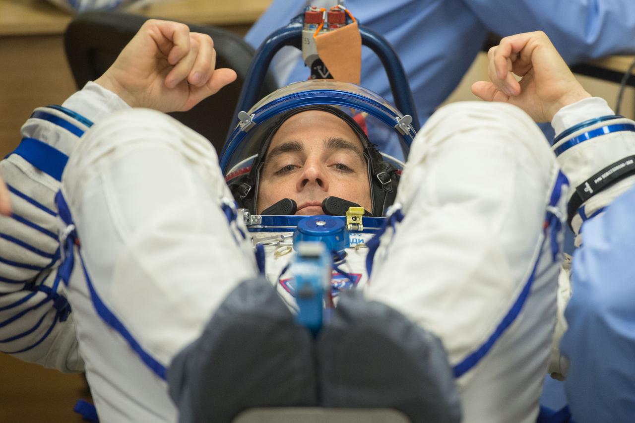 jsc2020e017098 - Expedition 63 Preflight - Expedition 63 crewmember Chris Cassidy of NASA has his Sokol suit pressure checked ahead of his launch on a Soyuz rocket with Anatoly Ivanishin and Ivan Vagner of Roscosmos, Thursday, April 9, 2020 at the Baikonur Cosmodrome in Kazakhstan. A few hours later, Vagner, Anatoly Ivanishin of Roscosmos, and Chris Cassidy of NASA lifted off for a six-and-a-half month mission on the International Space Station. Photo Credit: (NASA/GCTC/Andrey Shelepin)