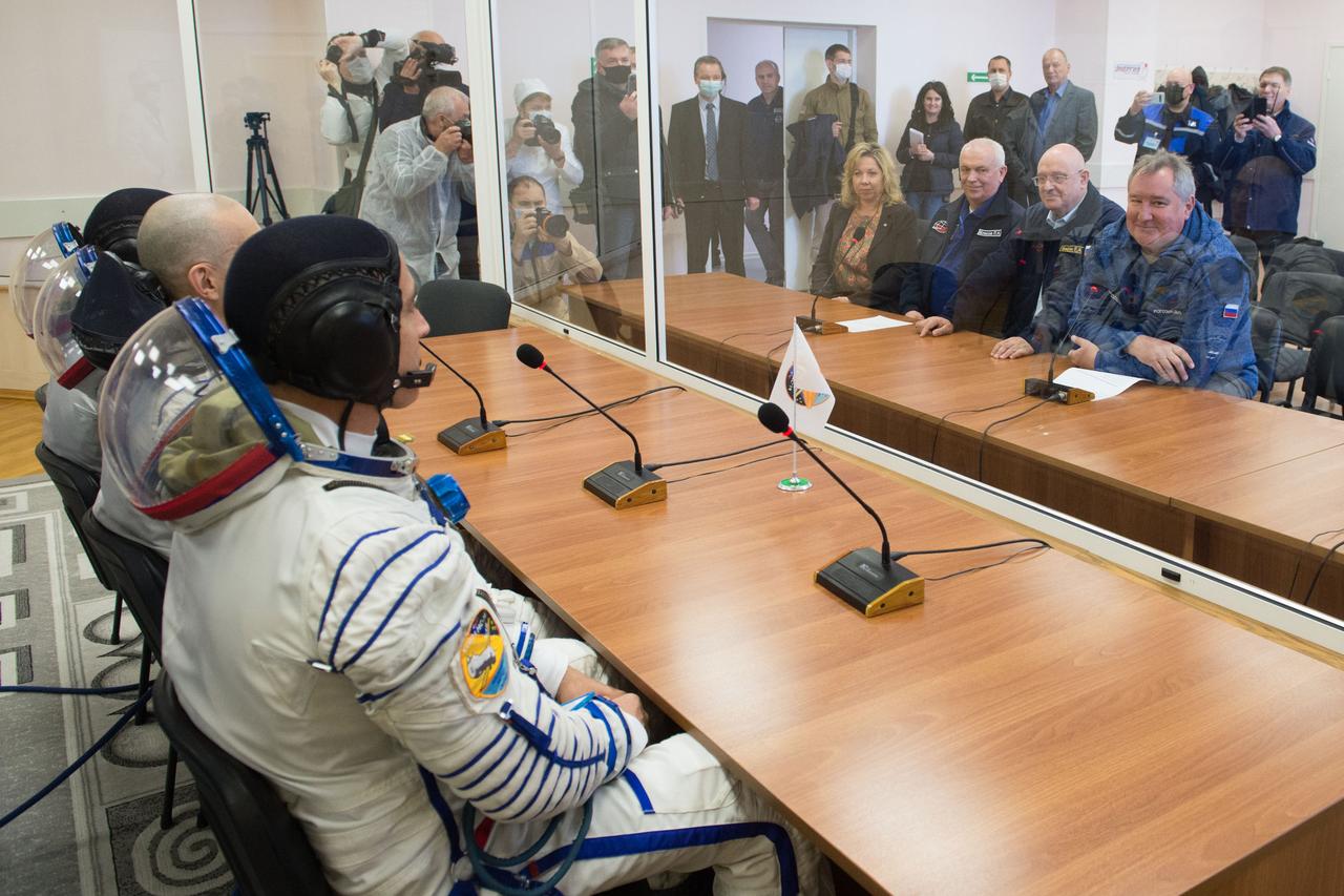 jsc2020e017105 - Expedition 63 Preflight - Expedition 63 crewmembers Chris Cassidy of NASA, Anatoly Ivanishin and Ivan Vagner of Roscosmos, talk to Roscosmos Director General Dmitry Rogozin, right, NASA Director for Human Space Flight Programs, Russia, Tricia Mack, left, and other mission managers prior to departing for the launch pad, Thursday, April 9, 2020 at the Baikonur Cosmodrome in Kazakhstan. A few hours later, they lifted off on a Soyuz rocket for a six-and-a-half month mission on the International Space Station. Photo Credit: (NASA/GCTC/Andrey Shelepin)...