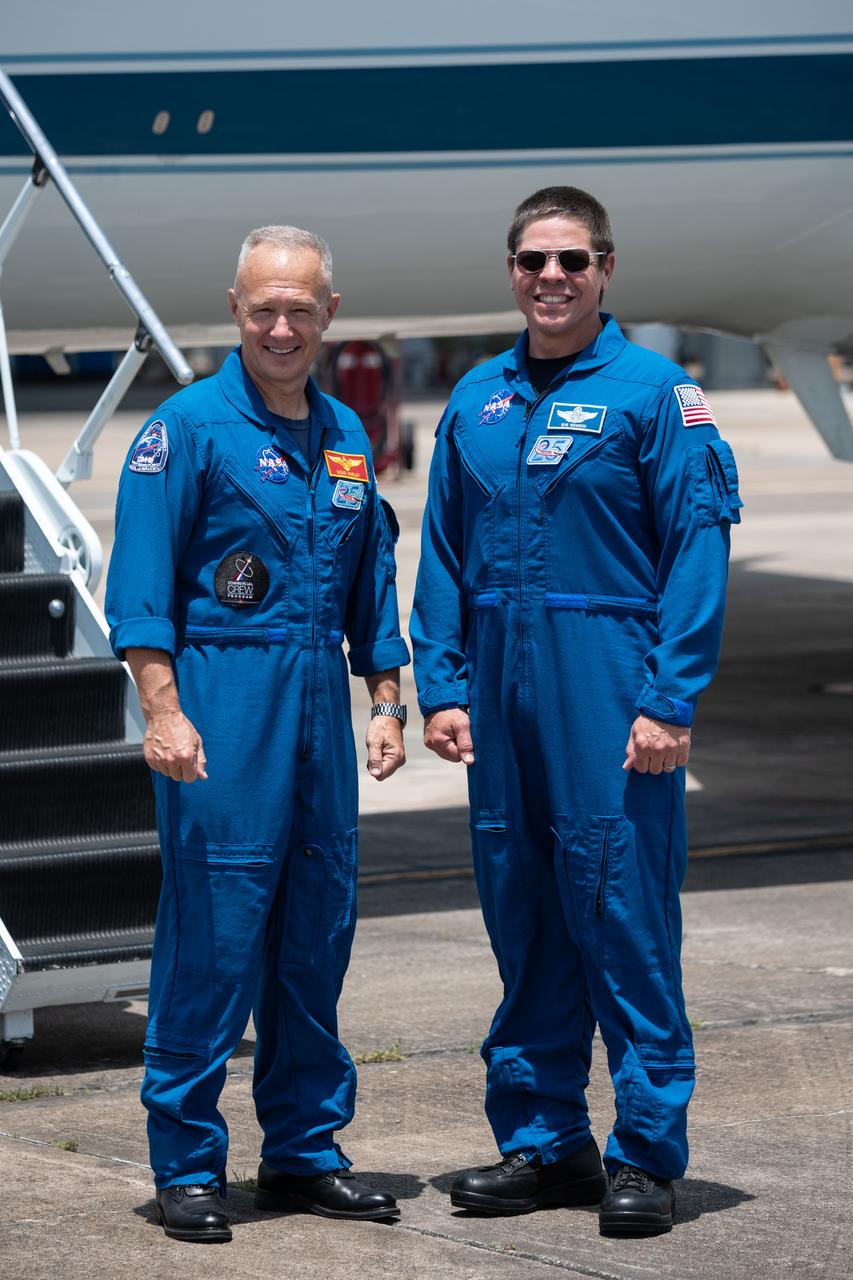 Date: 05-20-2020 Location: Ellington Field - Hangar 276 Tarmac Subject: At Ellington Field near NASA’s Johnson Space Center in Houston, astronauts Douglas Hurley(left) and Robert Behnken pose for a photo before boarding the Gulfstream jet that will carry them to the agency’s Kennedy Space Center in Florida on May 20, 2020, in preparation for NASA’s SpaceX Demo-2 mission. Under NASA’s Commercial Crew Program, Behnken and Hurley will be the first astronauts to launch to the International Space Station from U.S. soil since the end of the Space Shuttle Program in 2011. Liftoff of the SpaceX Falcon 9 rocket and Crew Dragon spacecraft is scheduled for 4:33 p.m. on May 27 from Kennedy’s Launch Complex 39A.