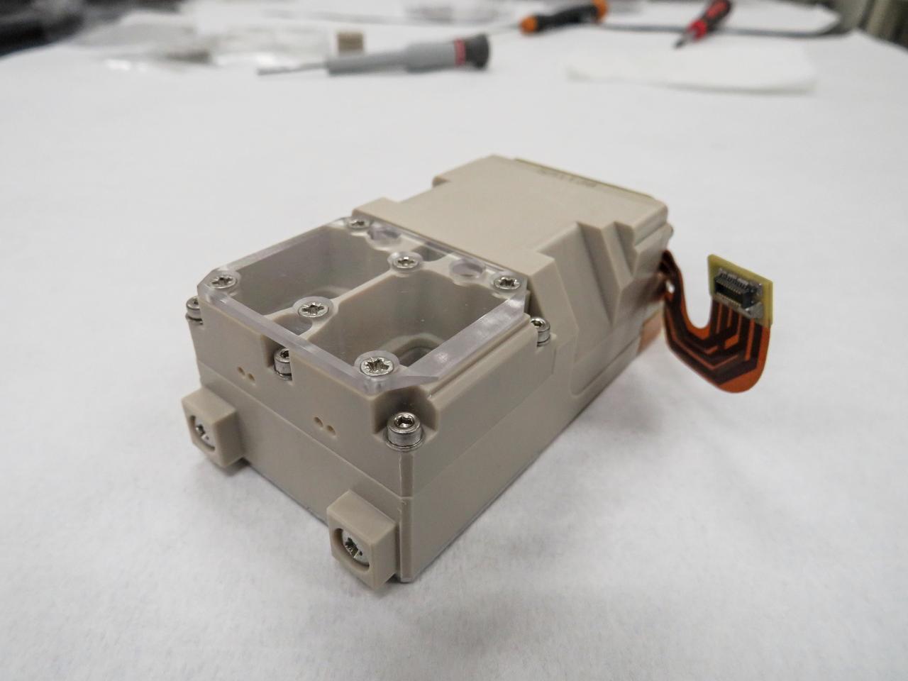 jsc2020e040947 (7/18/2019) A view of BioAsteroid Experiment Unit where the experiment is performed. Each Experiment Unit has 2 culture chambers. The BioAsteroid investigation studies how gravity affects the interaction between microbes and rock in a liquid medium. It is hoped that BioAsteroid can provide researchers a better understanding of basic physical processes - such as gravity, convection, and mixing - that control the way liquids mix with rocks and microbes. This will inform biomining, use of regolith in life support systems, and other bioprocessing applications involving rocks and regolith.