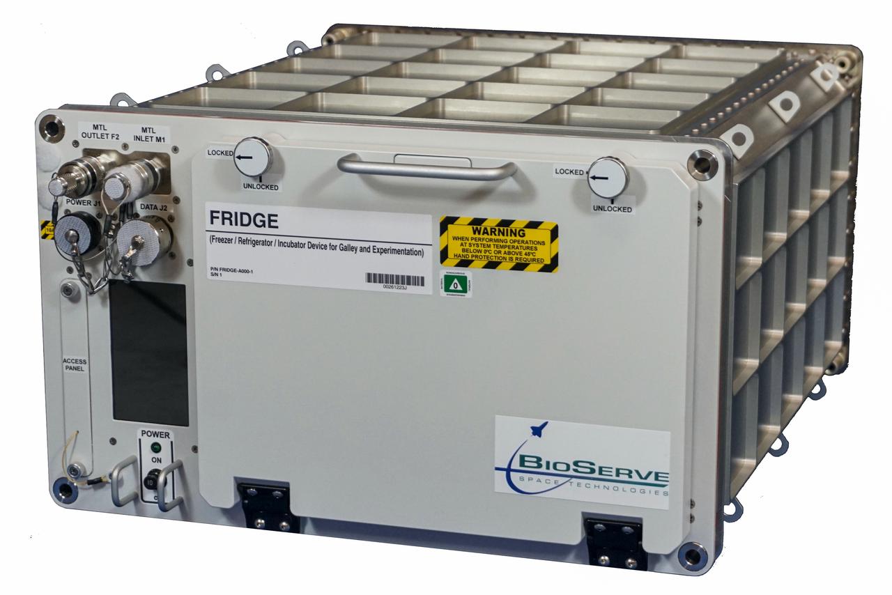 jsc2020e040949 (2/21/2020) --- A preflight view of Freezer / Refrigerator / Incubator Device for Galley and Experimentation (FRIDGE). The Galley Refrigerator-Freezer, or Freezer/Refrigerator/Incubator Device for Galley and Experimentation (FRIDGE) is a locker-sized unit that provides active temperature control with a range from -20.0°C to +48.0°C. It can accommodate storage of both crew galley items and scientific research samples and can be fully operated and maintained from the ground.