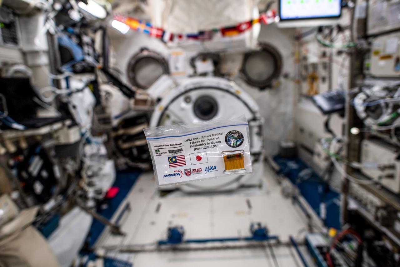 jsc2020e040981 (9/4/2019) --- I view of the IVA-SOFPADS floating inside the Kibo module aboard the International Space Station (ISS). The objective of the Smart Optical Fibers for Passive Dosimetry in Space (SOFPADS), or Fiber Dosimeter, investigation is to evaluate the use of fabricated optical fibers as space radiation passive dosimeters to monitor the radiation environment inside and outside of the International Space Station (ISS).  Image Credit: NASA/JAXA