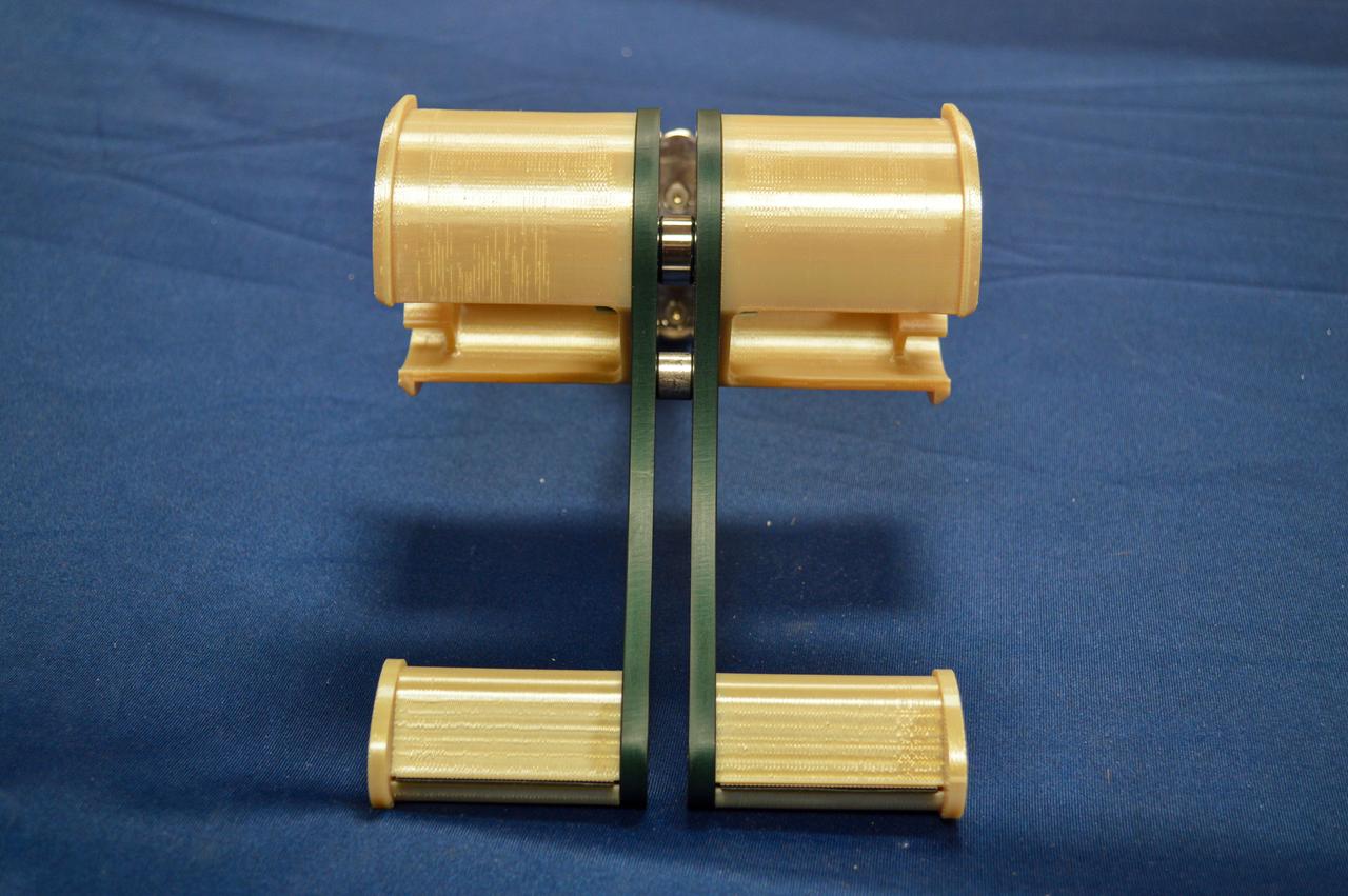 jsc2020e045049 (8/19/2020) --- Preflight bench review imagery of the High school students United with NASA to Create Hardware (HUNCH) Tape Dispenser (HUNCH Tape Dispenser). The dispenser enables one-handed operation for crew members. Crew members regularly use tape for mundane and critical tasks, but the tape must be cut with scissors, requiring two hands. The HUNCH Tape Dispenser is expected to improve efficiency of operations and scientific research on the space station.