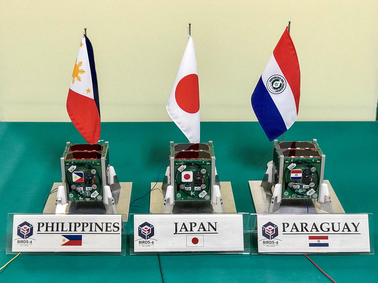 jsc2020e049619 (2/4/2020) --- A preflight view of the three BIRDS-4 Flight units inside clean room of Kyushu Insitute of Technology. The Joint Global Multi Nation Birds or BIRDS-4 Project is a constellation of three 1U CubeSats developed by Japan, Philippines and Paraguay, with Paraguay launching their first satellite. The mission of the BIRDS-4 satellites is to test commercial off-the-shelf components, as well as new technologies in space. Image Credit: Mark Angelo Purio