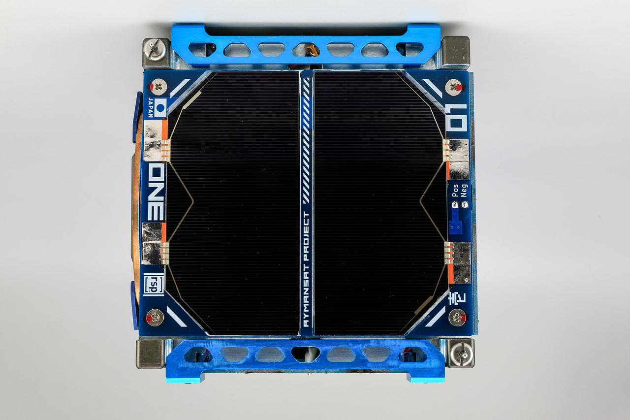 jsc2021e004420 (10/3/2020) --- A pre-flight view of the top of the RSP-01 Flight Model. The RSP-01 satellite is a 1-Unit (1U) CubeSat that deploys during the JEM Small Satellite Orbital Deployer-16 (J-SSOD-16) micro-satellite deployment mission and is handled by the Japanese Experiment Module Remote Manipulator System (JEMRMS). RSP-01 is developed by Rymansat Spaces and launches to the International Space Station aboard the NG-15 Cygnus Cargo Vehicle. Image Credit: Rymansat Spaces.