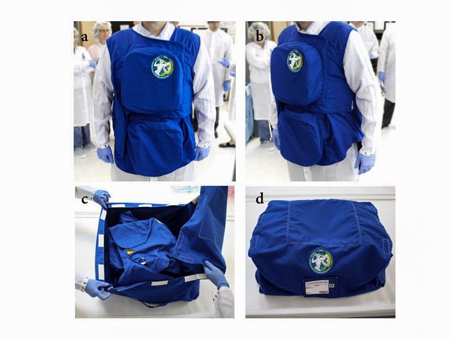 jsc2021e009421 (3/2/2021) --- A preflight view of the PERSEO garment prototype inspection and configuration for launch. (a,b) Garment worn during pre-flight inspections at Johnson Space Center (JSC) in Houston, USA, before launch, front and lateral view. (c) Garment folded in the transport bag for the launch configuration. (d) Closed transport bag containing.the garment. Image courtesy of the Italian Space Agency (ASI).