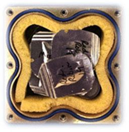 jsc2021e009429 (3/2/2021) --- Materials International Space Station Experiment-14-NASA (MISSE-14-NASA) continues a series of tests by NASA Glenn Research Center on how the harsh environment of space affects the performance and durability of various materials. Seed packets in the Equipment (EUE) container.  Image courtesy of Jeff Richards.