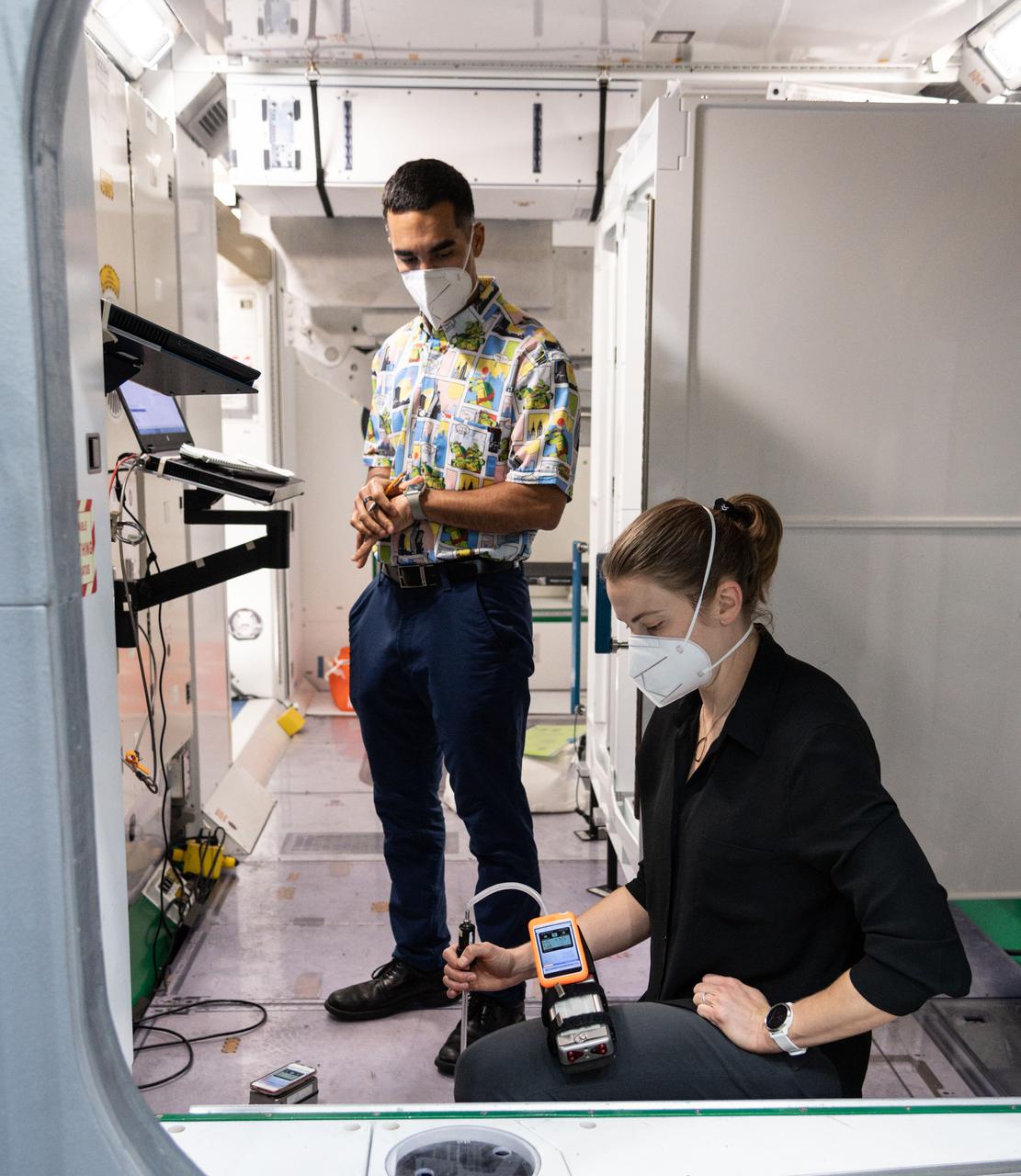 jsc2021e009505 (March 3, 2021) --- SpaceX Crew-3 astronauts (from left) Raja Chari and Kayla Barron are pictured during a training session at the Space Vehicle Mockup Facility at NASA's Johnson Space Center in Houston, Texas.