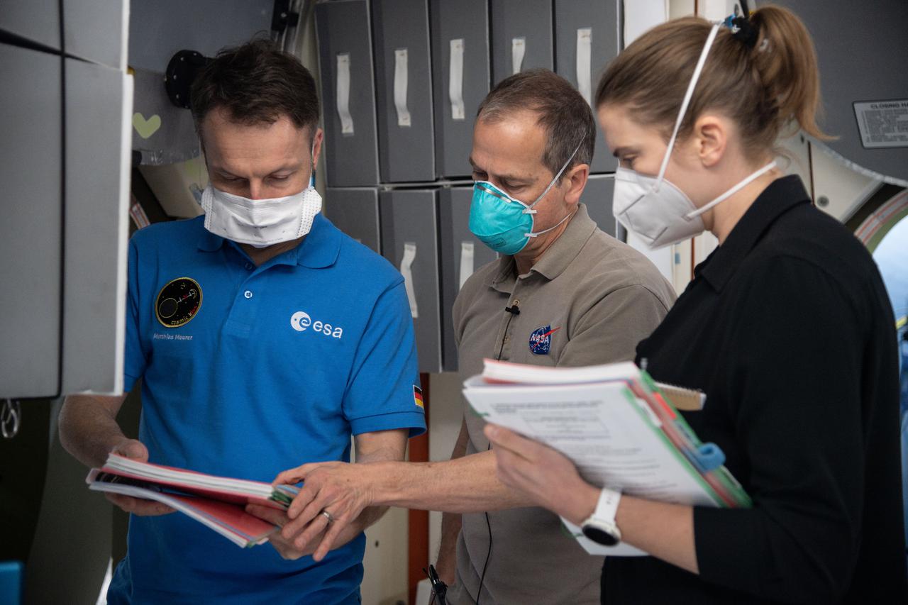 jsc2021e009537 (March 3, 2021) --- SpaceX Crew-3 astronauts (from left) Matthias Maurer, Thomas Marshburn and Kayla Barron are pictured during a training session at the Space Vehicle Mockup Facility at NASA's Johnson Space Center in Houston, Texas.
