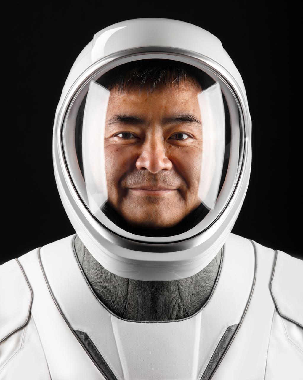 jsc2021e010825 (March 24, 2021) --- Astronaut Akihiko Hoshide of the Japan Aerospace Exploration Agency, SpaceX Crew-2 Mission Specialist, poses for a portrait in his pressure suit at SpaceX headquarters in Hawthorne, California. Credit: SpaceX