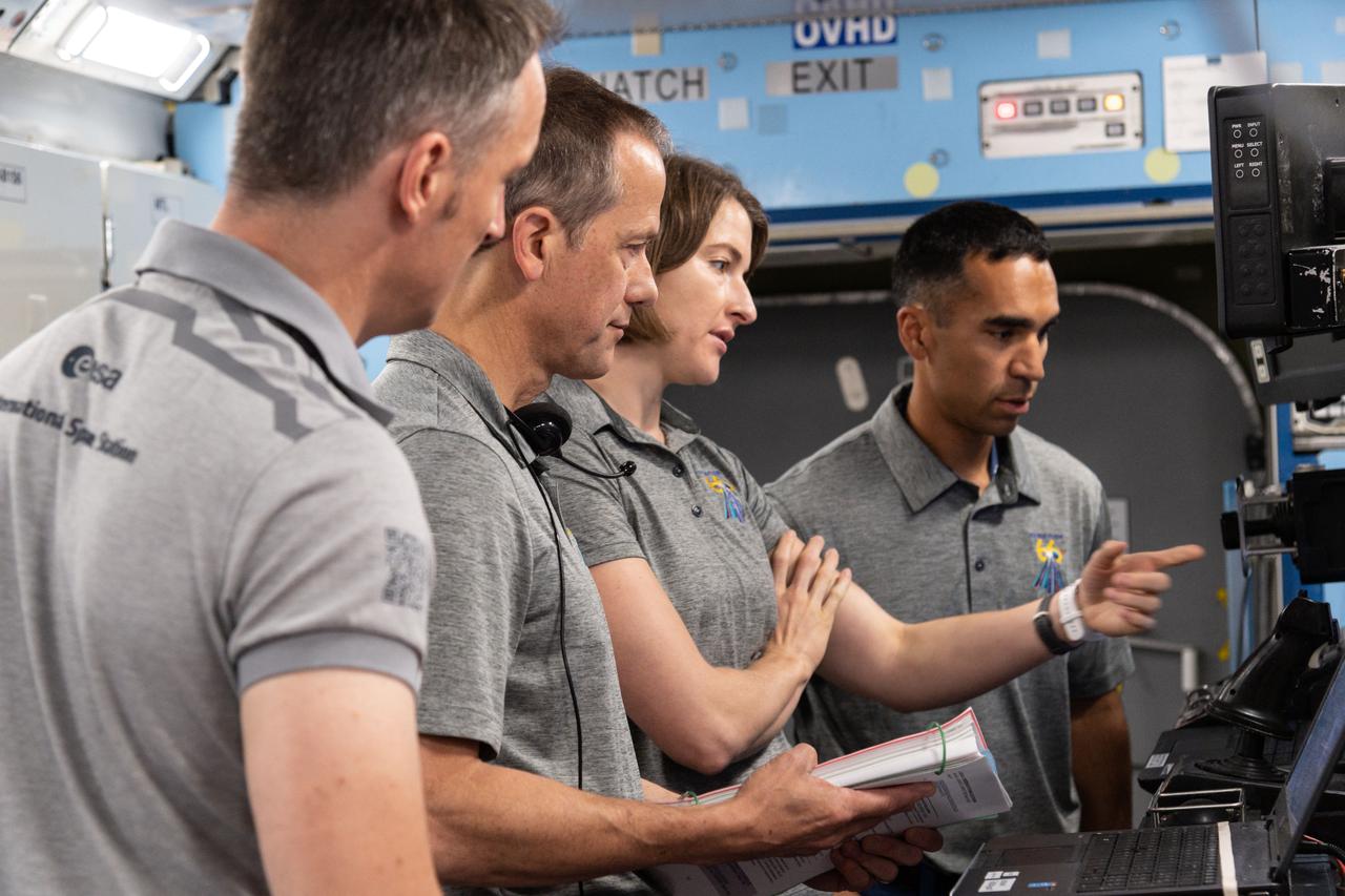 jsc2021e023380 (June 18, 2021) --- SpaceX Crew-3 astronauts (from left) Matthias Maurer, Thomas Marshburn, Kayla Barron and Raja Chari train at the Space Vehicle Mockup Facility at NASA's Johnson Space Center in Houston, Texas.