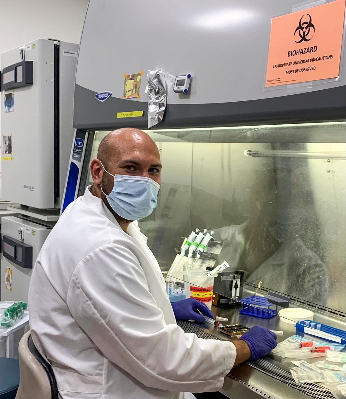 jsc2021e031156 (7/22/2021) --- A photo of postdoctoral fellow, Bugra Ayan, PhD, exchanging the media of the engineered skeletal muscle bioreactor. Tissue Engineered Muscle in Microgravity as a Novel Platform to Study Sarcopenia (Cardinal Muscle) evaluates whether engineered human muscle cells cultured in microgravity are a valid model for studying muscle loss. Photo courtesy of the Palo Alto Veterans Institute for Research.