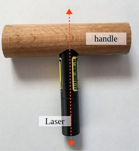 jsc2021e037886 (8/242021) --- A preflight photo of the First object to be observed rotating around its intermediate axis, made from a laser-pointer and a wooden handle for the Dzhanibekov Demonstrations investigation. Image courtesy of DLR.