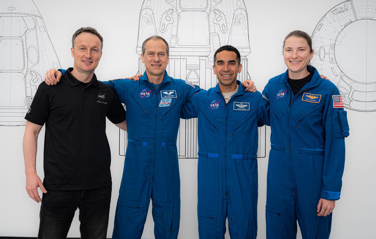 jsc2021e038354 (May 6, 2021) --- SpaceX Crew-3 astronauts (from left) Matthias Maurer, Thomas Marshburn, Raja Chari and Kayla Barron pose for a portrait during preflight training at SpaceX headquarters in Hawthorne, California. Credit: SpaceX
