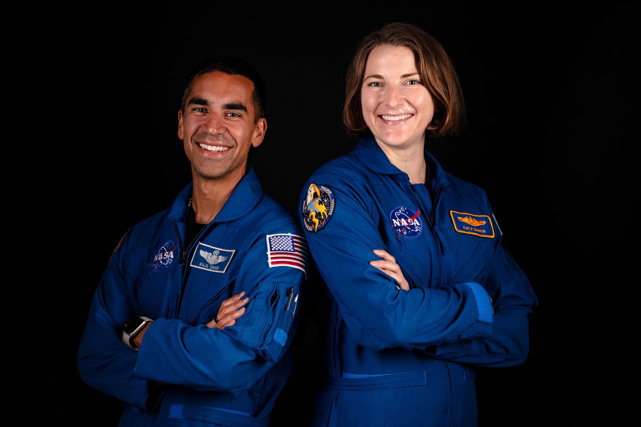 jsc2021e038365 (June 25, 2021) --- NASA astronauts and SpaceX Crew-3 crew members Raja Chari and Kayla Barron pose for a portrait at SpaceX headquarters in Hawthorne, California. Credit: SpaceX