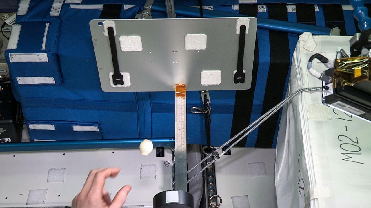 jsc2021e042553 (8/31/2021) --- Collision experiments conducted during Granular Damping Part I by ESA astronaut Alexander Gerst during increment 56 in 2018. The Granular Damping (ESA-EPO-Granular Damping) investigation studies the dynamics of granular matter (e.g. sand, corn, snow, rocks, dust or similar). Granular matter sediments on Earth, but can form a gas-like state of matter in space. Image courtesy of DLR/ESA