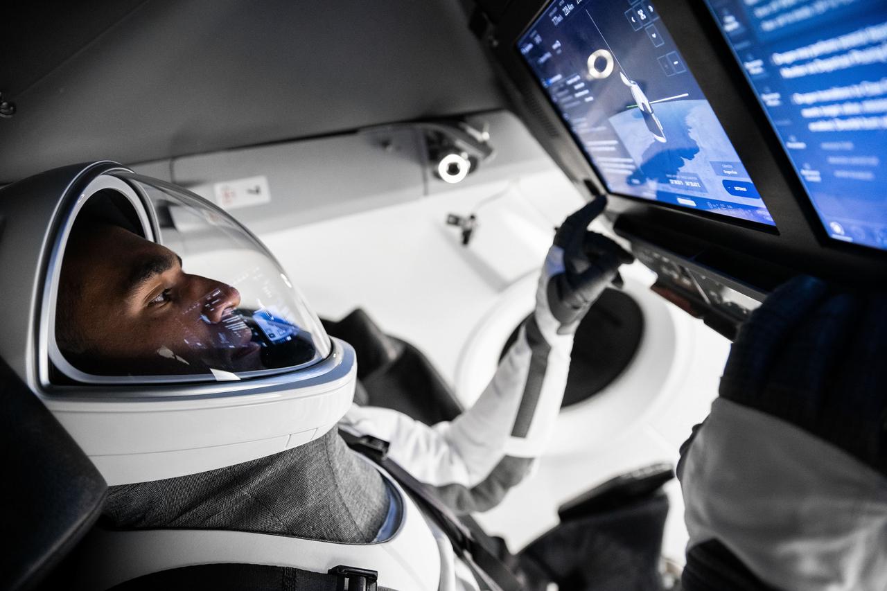 jsc2021e042708 (Aug. 30, 2021) --- NASA astronaut and SpaceX Crew-3 Commander Raja Chari poses for a portrait in his spacesuit during a training session at SpaceX headquarters in Hawthorns, California. Credit: SpaceX