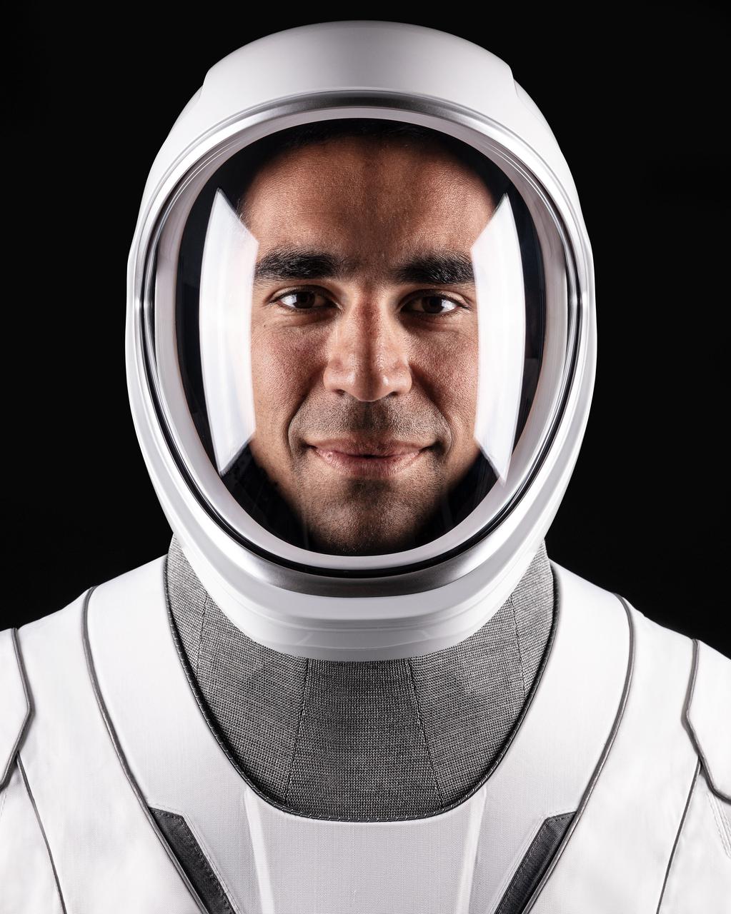 jsc2021e044936 (Sept. 29, 2021) --- Astronaut Raja Chari of NASA's Commercial Crew Program SpaceX Crew-3 Commander, poses for a portrait in his pressure suit at SpaceX headquarters in Hawthorne, California. Credit: SpaceX