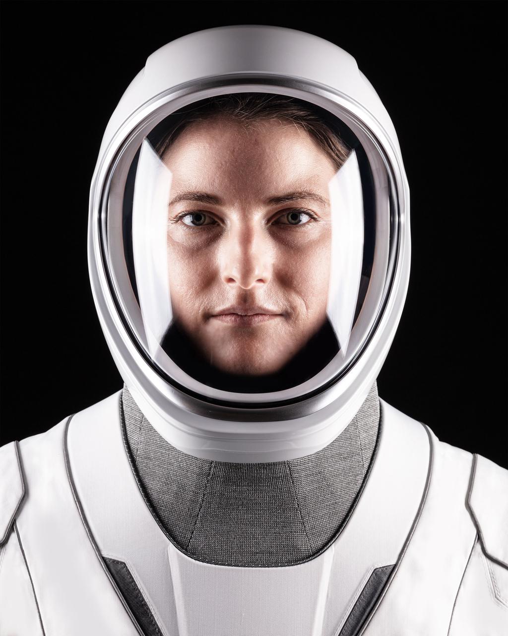 jsc2021e044938 (Sept. 29, 2021) --- Astronaut Kayla Barron of NASA's Commercial Crew Program, SpaceX Crew-3 Mission Specialist, poses for a portrait in her pressure suit at SpaceX headquarters in Hawthorne, California. Credit: SpaceX