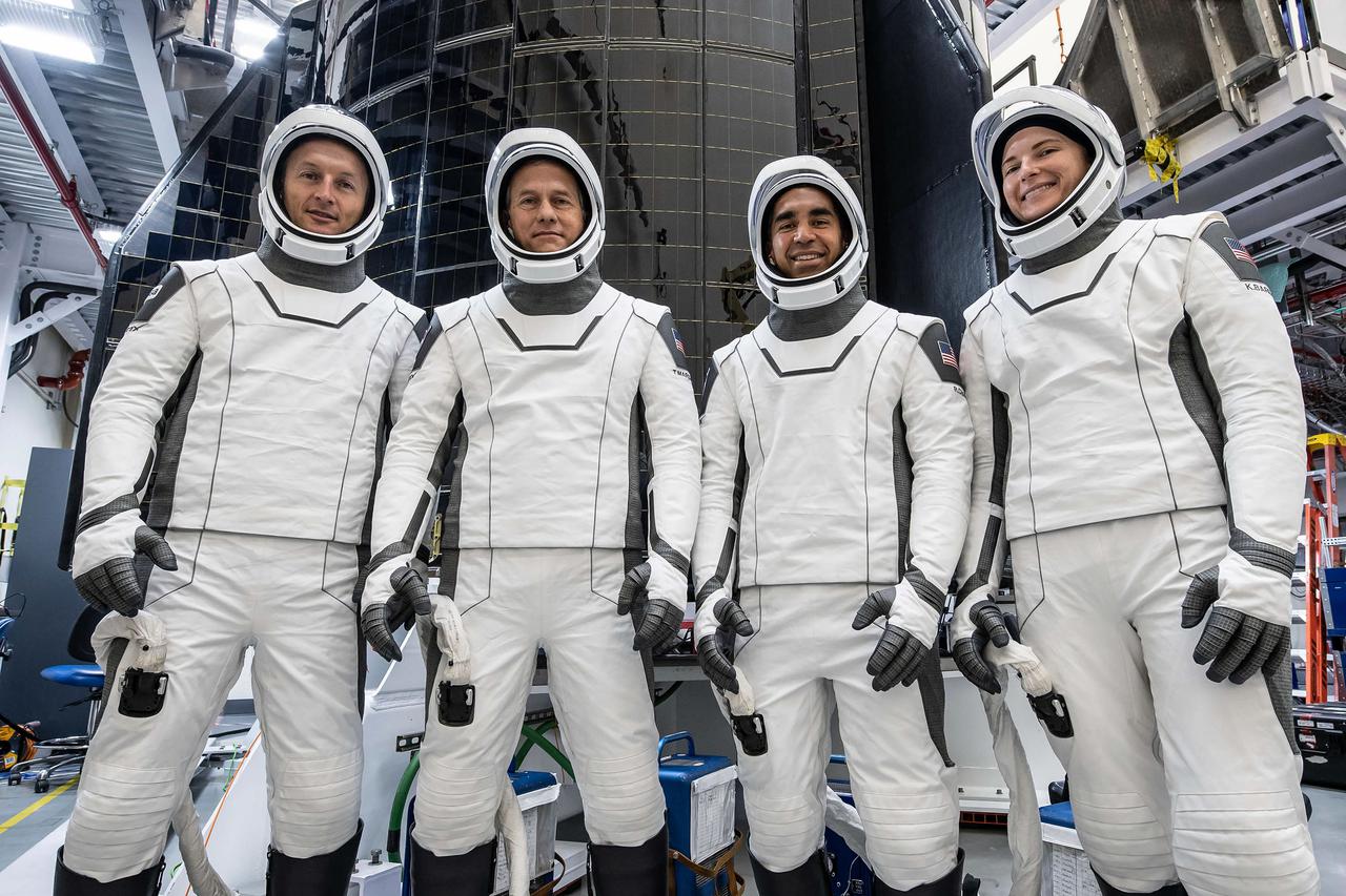 jsc2021e046402 (Oct. 9, 2021) --- The astronauts of SpaceX Crew-3 pose for a portrait in their suits during a training session. From left are, ESA (European Space Agency) astronaut Matthias Maurer and NASA astronauts Thomas Marshburn, Raja Chari and Kayla Barron. Chari is Commander, Marshburn is the Pilot, and Barron and Maurer are both Mission Specialists. Credit: SpaceX