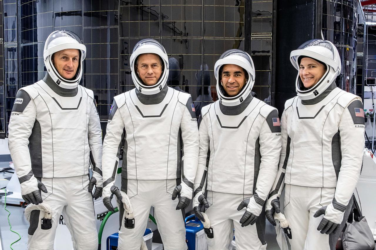 jsc2021e046405 (Oct. 9, 2021) --- The astronauts of SpaceX Crew-3 pose for a portrait in their suits during a training session. From left are, ESA (European Space Agency) astronaut Matthias Maurer and NASA astronauts Thomas Marshburn, Raja Chari and Kayla Barron. Chari is Commander, Marshburn is the Pilot, and Barron and Maurer are both Mission Specialists. Credit: SpaceX