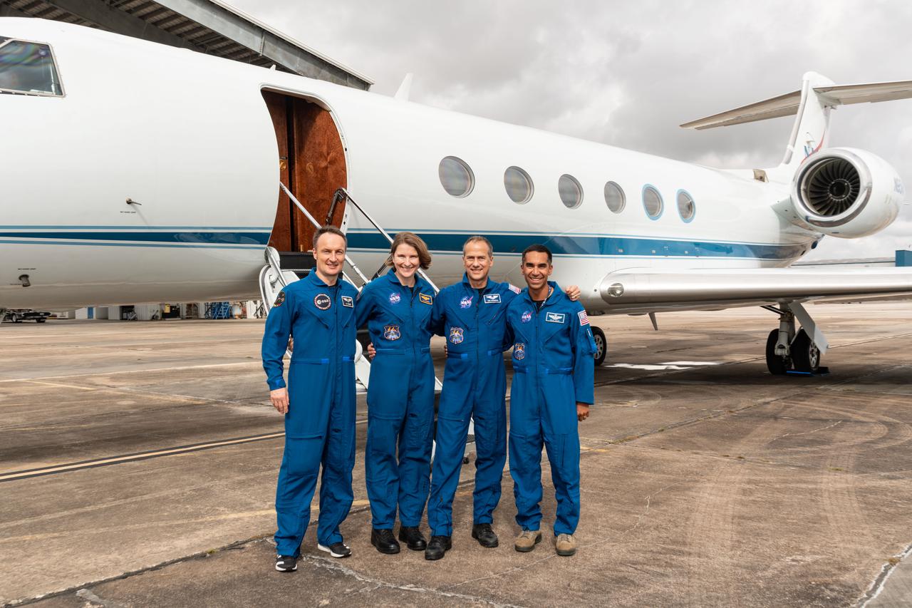 jsc2021e048158 (Oct. 26, 2021) --- SpaceX Crew-3 astronauts (from left) Matthias Maurer from ESA (European Space Agency) with Kayla Barron, Thomas Marshburn and Raja Chari, all from NASA, are at Ellington Field in Houston, Texas. The quartet were preparing to depart from Houston aboard NASA's Gulfstream V research aircraft to Kennedy Space Center in Florida. The foursome plan to launch on Oct. 31, 2021, aboard the SpaceX Crew Dragon Endurance to the International Space Station for a six-month mission.