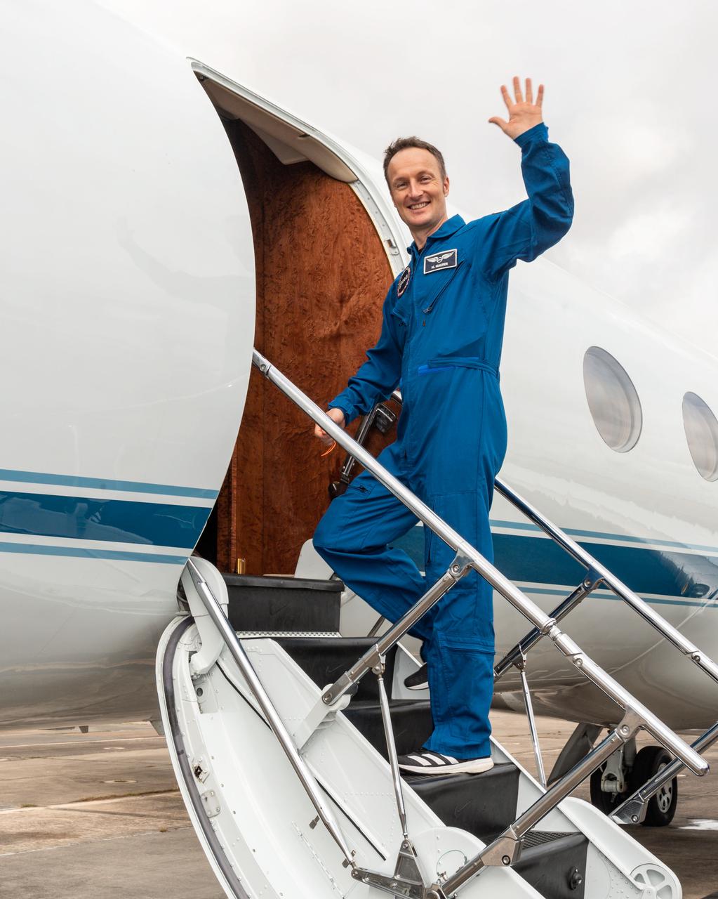 jsc2021e048160 (Oct. 26, 2021) --- SpaceX Crew-3 astronaut Matthias Maurer from ESA (European Space Agency) boards NASA's Gulfstream V research aircraft preparing to depart from Ellington Field in Houston to Kennedy Space Center in Florida. He and fellow Crew-3 astronauts Raja Chari, Thomas Marshburn and Kayla Barron, all from NASA, plan to launch on Oct. 31, 2021, aboard the SpaceX Crew Dragon Endurance to the International Space Station for a six-month mission.