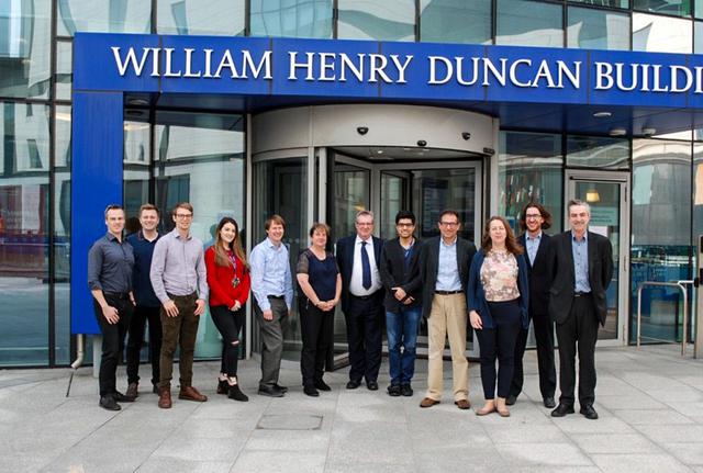 jsc2021e058711 (11/10/2021) --- The MicroAge team outside the Institute of Life Course and Medical Sciences, University of Liverpool. From left to right: James Henstock, Adam Janvier, William Blackler, Samantha Jones, Kai Hoettges, Anne McArdle, Chris McArdle, Shahjahan Shigdar, Gianluca Neri, Libby Jackson, Malcolm Jackson. The Micro Age investigation helps identify the mechanisms by which astronauts lose skeletal muscle mass in microgravity and identify optimum exercise regimens, nutritional, or pharmacological interventions for prevention. Image courtesy of University of Liverpool.