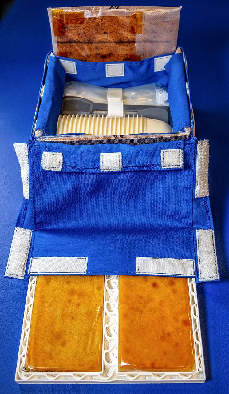 jsc2021e063281 (12/9/20210 --- Preflight image of the Food Processor consumables Kit which uses Edible prodcuts and Renewable pad as new protection Foam.  © CNES/DE PRADA Thierry, 2020