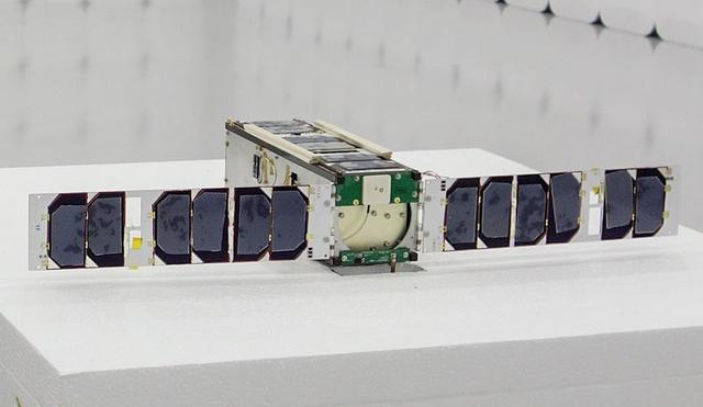 jsc2022e000003 (6/7/2019) --- A preflight image of IHI-SAT in the panels deployed configuration. IHI-SAT is the 3U CubeSat designed, developed and launched by IHI Corporation with support of Tohoku University. IHI-SAT demonstrates advanced AIS (automatic identification system) receiving system. This new system improves a ship’s detection rate in a sea area where many other ships are under way. Image Credit: Image courtesy of IHI Corporation.