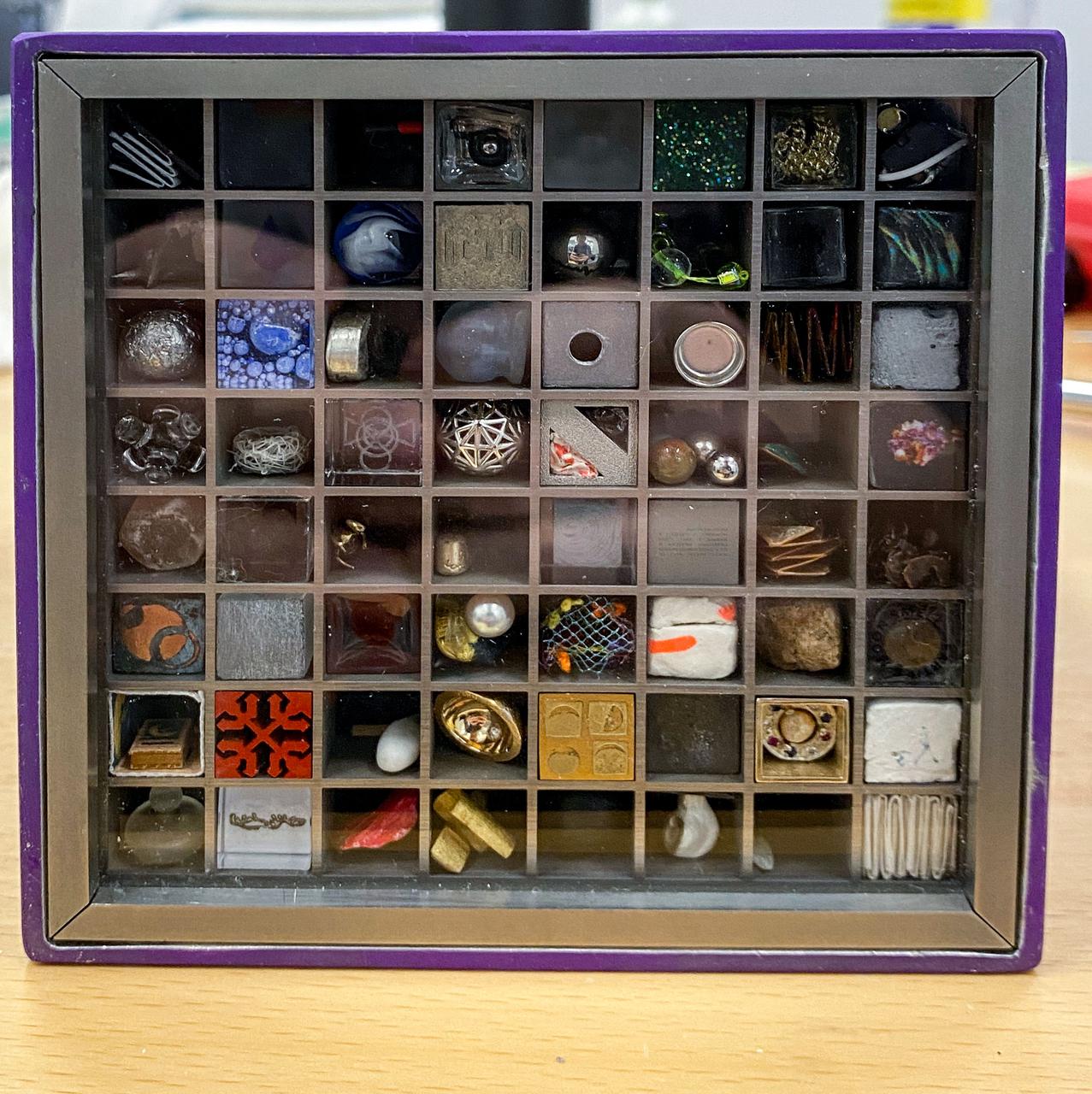 jsc2022e008880 (12/9/2021) --- A preflight view of the Moon Gallery payload. Moon Gallery evaluates the performance of a single-board computer platform with a high-quality camera in the space station’s radiation environment. Photos and videos taken with the camera become part of an art installation known as the Moon Gallery. The camera could be used in future space platforms and science hardware.