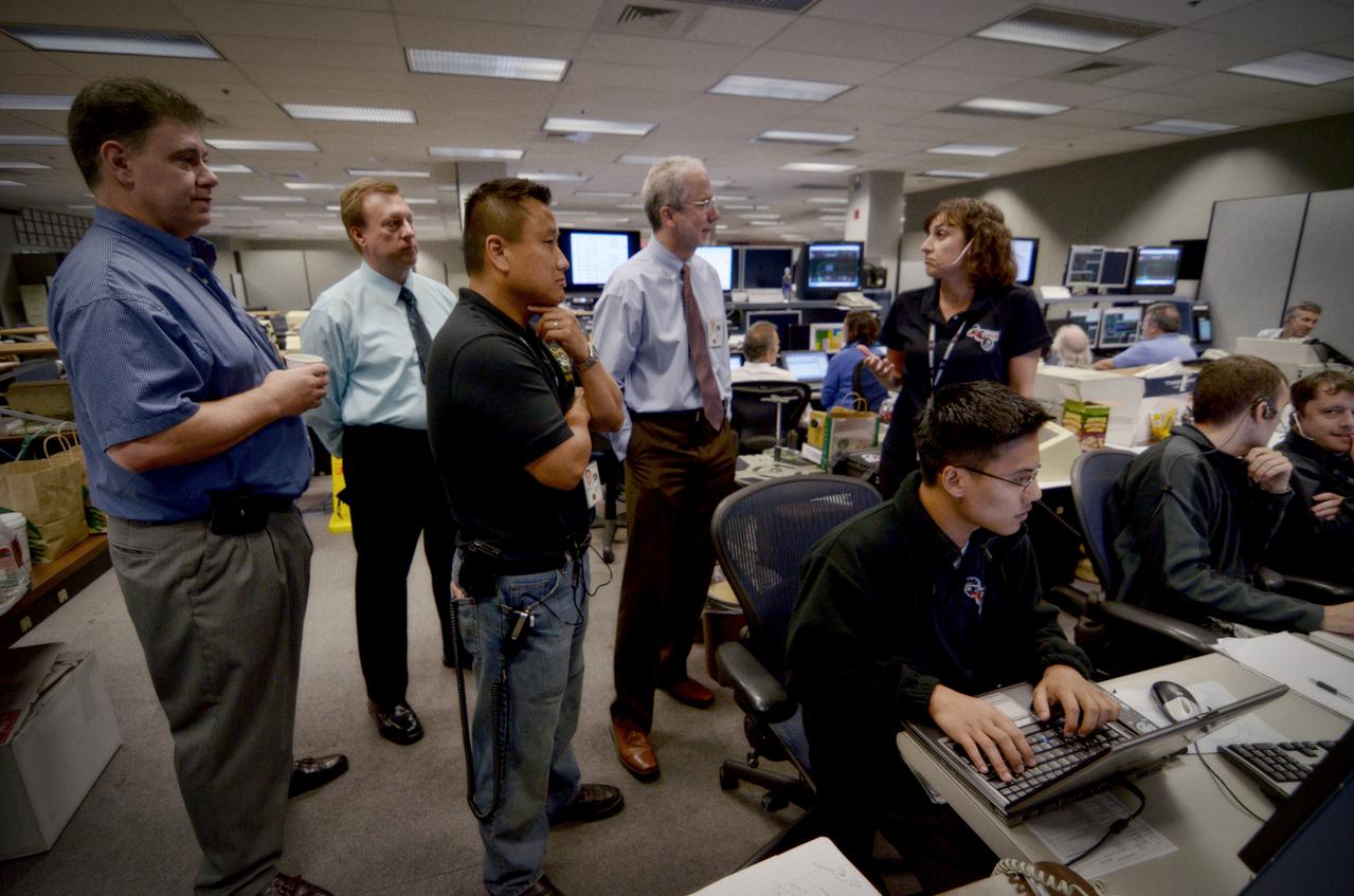 Teams conduct powerup and docking operations for the Sensor Test for Orion Relative Navigation Risk Mitigation (STORRM) in a payload support room at Johnson Space Center’s Mission Control Center in Houston on May 18, 2011. STORRM was successfully demonstrated on Space Shuttle Endeavour’s STS-134 mission to the International Space Station. The goal of STORRM was to validate a new relative navigation sensor based on advanced laser and detector technology that will make docking and undocking spacecraft easier and safer. It also tested the hardware in the same environment that the sensors would experience on the first Orion rendezvous to another vehicle.