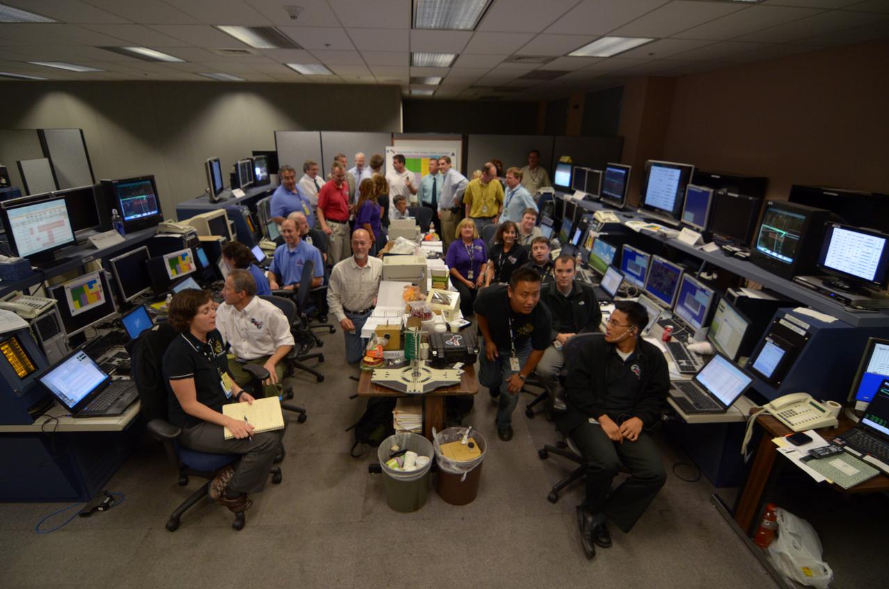 Teams conduct powerup and docking operations for the Sensor Test for Orion Relative Navigation Risk Mitigation (STORRM) in a payload support room at Johnson Space Center’s Mission Control Center in Houston on May 18, 2011. STORRM was successfully demonstrated on Space Shuttle Endeavour’s STS-134 mission to the International Space Station. The goal of STORRM was to validate a new relative navigation sensor based on advanced laser and detector technology that will make docking and undocking spacecraft easier and safer. It also tested the hardware in the same environment that the sensors would experience on the first Orion rendezvous to another vehicle.