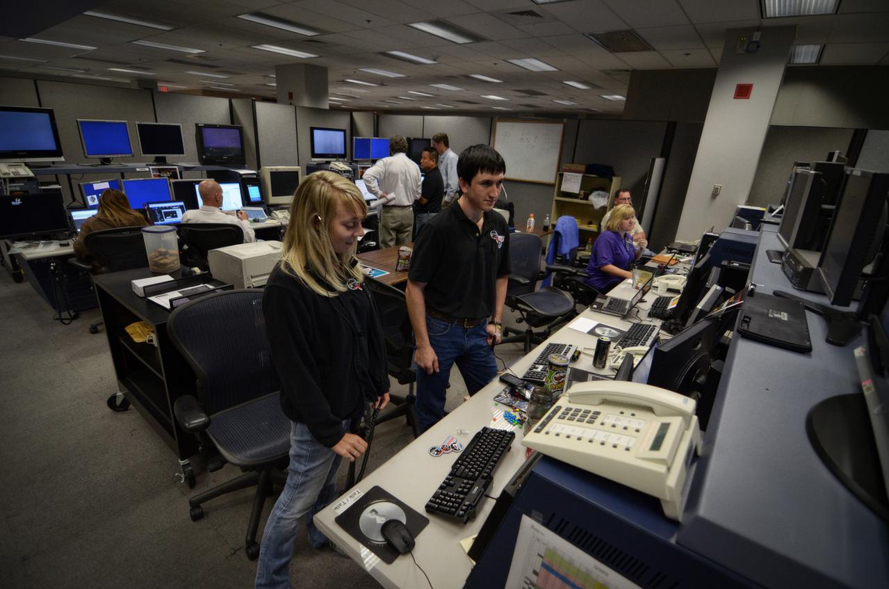 Teams conduct powerup and docking operations for the Sensor Test for Orion Relative Navigation Risk Mitigation (STORRM) in a payload support room at Johnson Space Center’s Mission Control Center in Houston on May 18, 2011. STORRM was successfully demonstrated on Space Shuttle Endeavour’s STS-134 mission to the International Space Station. The goal of STORRM was to validate a new relative navigation sensor based on advanced laser and detector technology that will make docking and undocking spacecraft easier and safer. It also tested the hardware in the same environment that the sensors would experience on the first Orion rendezvous to another vehicle.