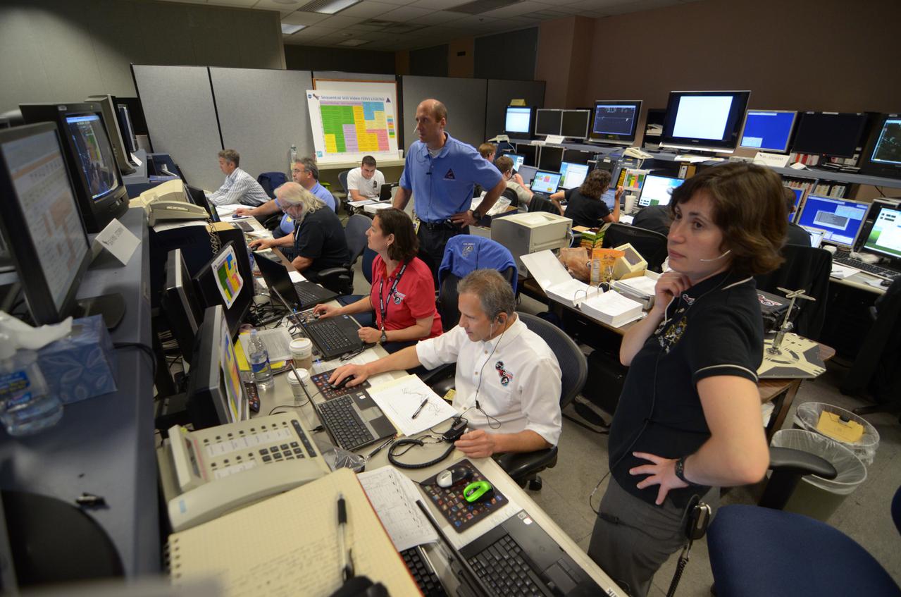 Teams conduct powerup and docking operations for the Sensor Test for Orion Relative Navigation Risk Mitigation (STORRM) in a payload support room at Johnson Space Center’s Mission Control Center in Houston on May 18, 2011. STORRM was successfully demonstrated on Space Shuttle Endeavour’s STS-134 mission to the International Space Station. The goal of STORRM was to validate a new relative navigation sensor based on advanced laser and detector technology that will make docking and undocking spacecraft easier and safer. It also tested the hardware in the same environment that the sensors would experience on the first Orion rendezvous to another vehicle.