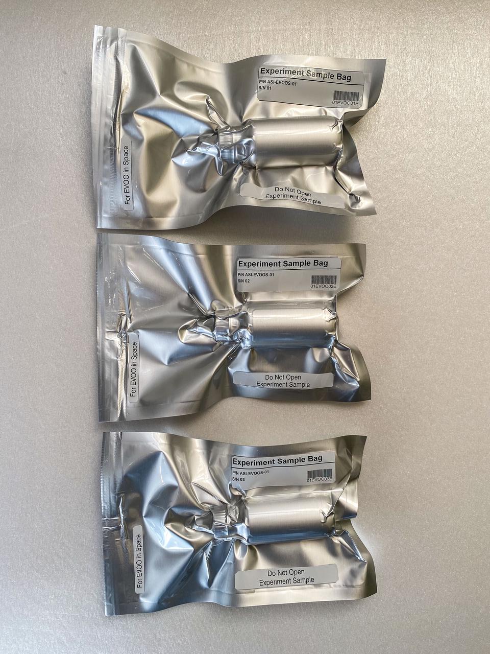 jsc2022e034193 (10/9/2021) ---  Preflight imagery of the Extra-Virgin Olive Oil in Space (EVOOS) samples vacuum sealed and labeled ready for shipment to NASA for launch. The Extra Virgin Olive Oil in Space (EVOO in Space) investigation studies the effects of exposure to the space environment on extra virgin olive oil. The physicochemical, sensorial, and nutritional characteristics of veiled and filtered extra virgin olive oils are compared to those from controls kept on the ground. Image courtesy of Stefano Polato.