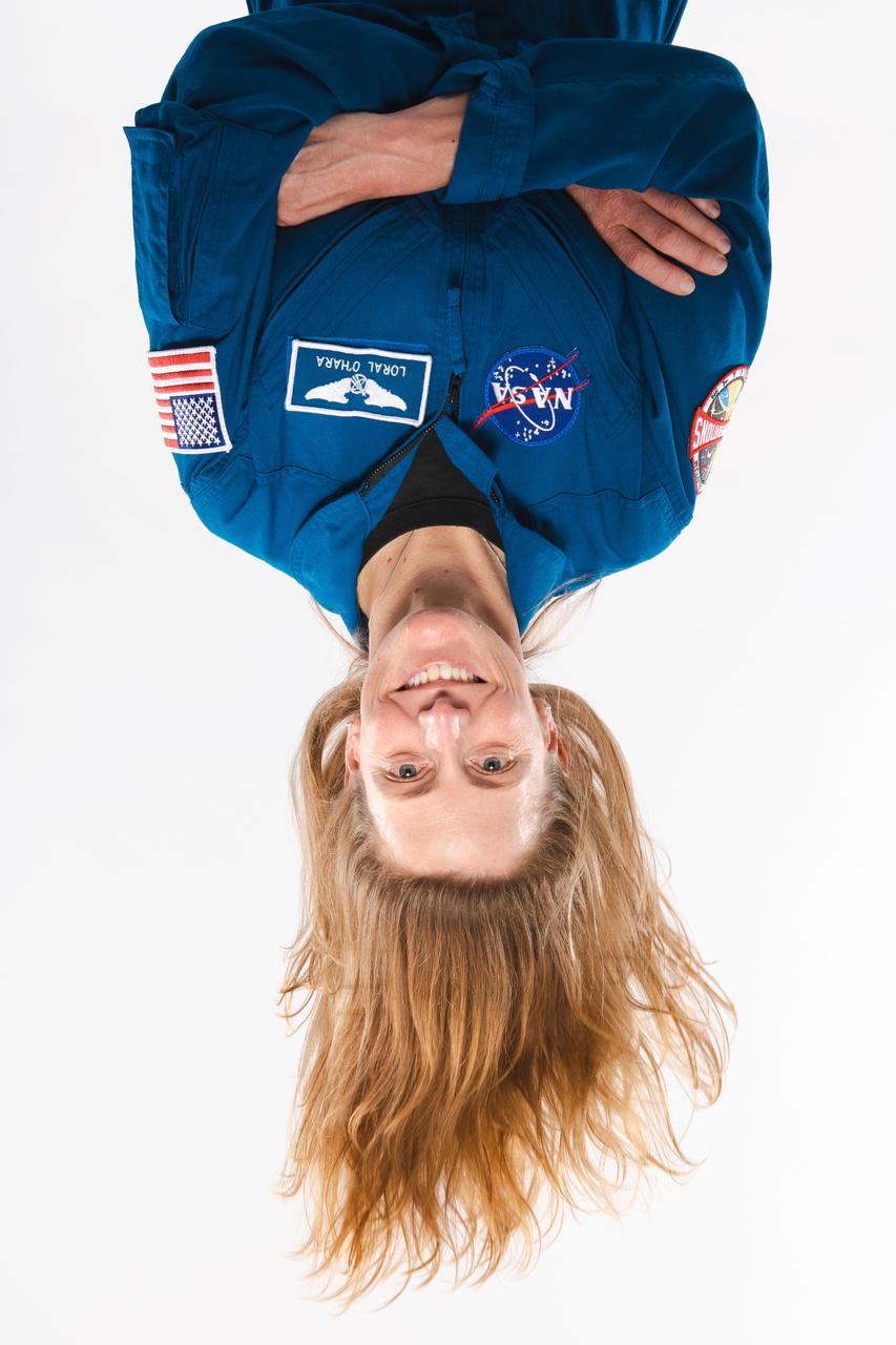 NASA astronaut Loral O'Hara brings a fresh perspective to portrait photography with a hair flip that seems to defy gravity at the NASA Johnson Space Center photo studio. Photographer: Josh Valcarcel – Johnson Space Center  