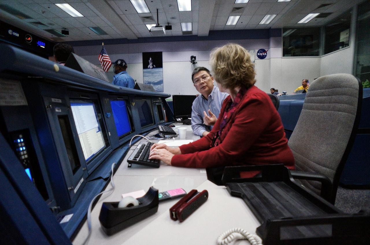 Orion teams complete a connectivity test in preparation for Exploration Flight Test-1 (EFT-1) in the Mission Control Center at Johnson Space Center in Houston on Jan. 30, 2011. Part of Batch image transfer from Flickr.