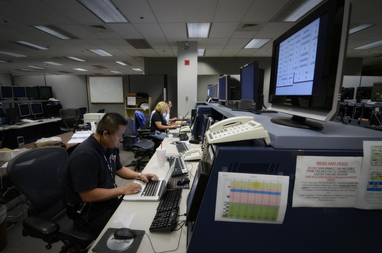 Teams conduct powerup and docking operations for the Sensor Test for Orion Relative Navigation Risk Mitigation (STORRM) in a payload support room at Johnson Space Center’s Mission Control Center in Houston on May 18, 2011. STORMM was successfully demonstrated on Space Shuttle Endeavour’s STS-134 mission to the International Space Station..The goal of STORRM was to validate a new relative navigation sensor based on advanced laser and detector technology that will make docking and undocking spacecraft easier and safer. It also tested the hardware in the same environment that the sensors would experience on the first Orion rendezvous to another vehicle. Part of Batch image transfer from Flickr.