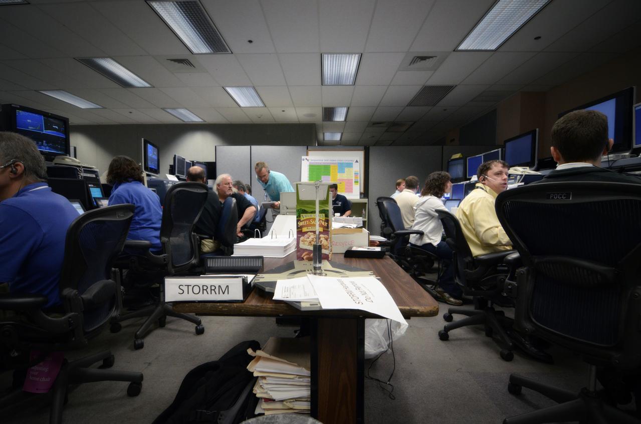 Teams conduct powerup and docking operations for the Sensor Test for Orion Relative Navigation Risk Mitigation (STORRM) in a payload support room at Johnson Space Center’s Mission Control Center in Houston on May 18, 2011. STORMM was successfully demonstrated on Space Shuttle Endeavour’s STS-134 mission to the International Space Station..The goal of STORRM was to validate a new relative navigation sensor based on advanced laser and detector technology that will make docking and undocking spacecraft easier and safer. It also tested the hardware in the same environment that the sensors would experience on the first Orion rendezvous to another vehicle. Part of Batch image transfer from Flickr.