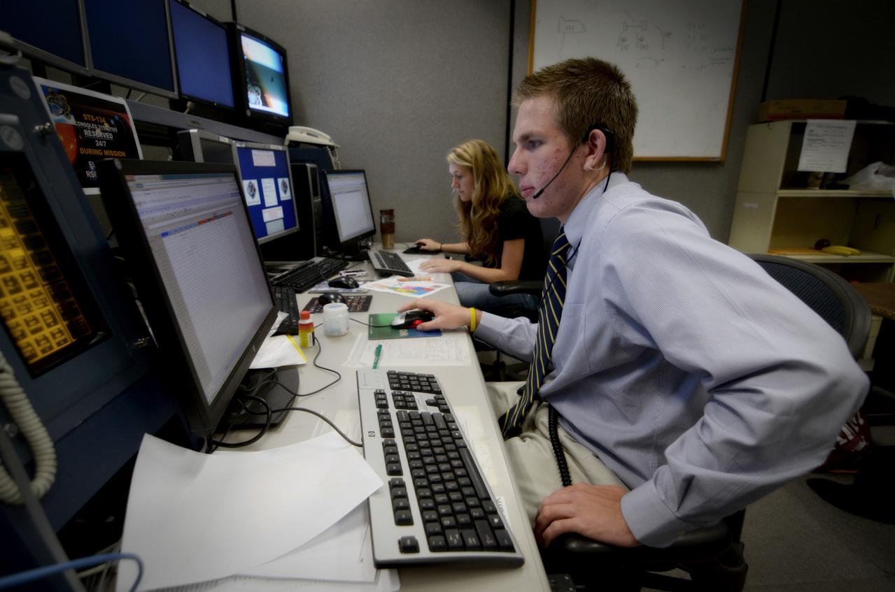 Teams conduct powerup and docking operations for the Sensor Test for Orion Relative Navigation Risk Mitigation (STORRM) in a payload support room at Johnson Space Center’s Mission Control Center in Houston on May 18, 2011. STORMM was successfully demonstrated on Space Shuttle Endeavour’s STS-134 mission to the International Space Station..The goal of STORRM was to validate a new relative navigation sensor based on advanced laser and detector technology that will make docking and undocking spacecraft easier and safer. It also tested the hardware in the same environment that the sensors would experience on the first Orion rendezvous to another vehicle. Part of Batch image transfer from Flickr.