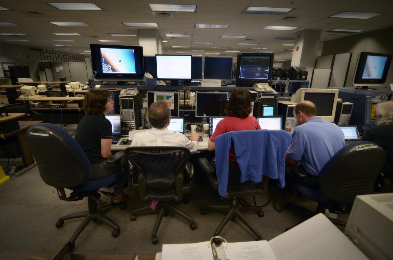 Teams conduct powerup and docking operations for the Sensor Test for Orion Relative Navigation Risk Mitigation (STORRM) in a payload support room at Johnson Space Center’s Mission Control Center in Houston on May 18, 2011. STORMM was successfully demonstrated on Space Shuttle Endeavour’s STS-134 mission to the International Space Station..The goal of STORRM was to validate a new relative navigation sensor based on advanced laser and detector technology that will make docking and undocking spacecraft easier and safer. It also tested the hardware in the same environment that the sensors would experience on the first Orion rendezvous to another vehicle. Part of Batch image transfer from Flickr.