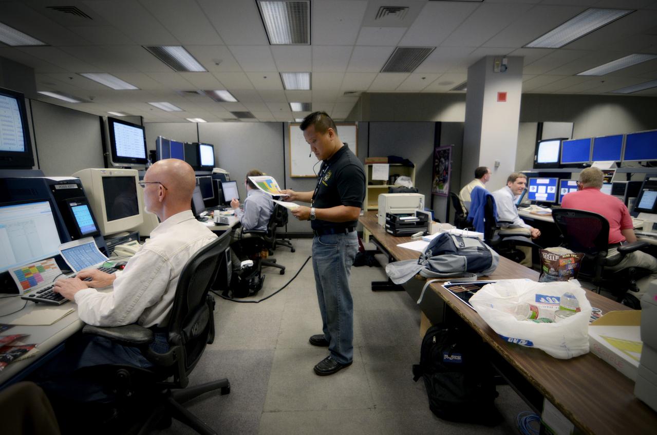 Teams conduct powerup and docking operations for the Sensor Test for Orion Relative Navigation Risk Mitigation (STORRM) in a payload support room at Johnson Space Center’s Mission Control Center in Houston on May 18, 2011. STORMM was successfully demonstrated on Space Shuttle Endeavour’s STS-134 mission to the International Space Station..The goal of STORRM was to validate a new relative navigation sensor based on advanced laser and detector technology that will make docking and undocking spacecraft easier and safer. It also tested the hardware in the same environment that the sensors would experience on the first Orion rendezvous to another vehicle. Part of Batch image transfer from Flickr.