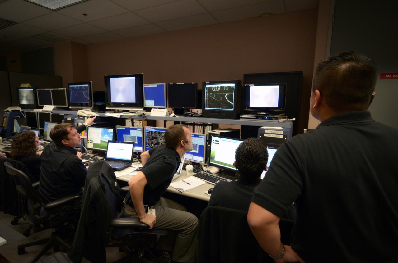 Teams conduct powerup and docking operations for the Sensor Test for Orion Relative Navigation Risk Mitigation (STORRM) in a payload support room at Johnson Space Center’s Mission Control Center in Houston on May 18, 2011. STORMM was successfully demonstrated on Space Shuttle Endeavour’s STS-134 mission to the International Space Station..The goal of STORRM was to validate a new relative navigation sensor based on advanced laser and detector technology that will make docking and undocking spacecraft easier and safer. It also tested the hardware in the same environment that the sensors would experience on the first Orion rendezvous to another vehicle. Part of Batch image transfer from Flickr.