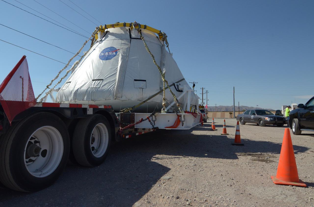 Travelers take a photo with the Orion crew module flown on NASA’s Pad Abort-1 (PA-1) flight test on the road on June 15, 2011. Part of Batch image transfer from Flickr.