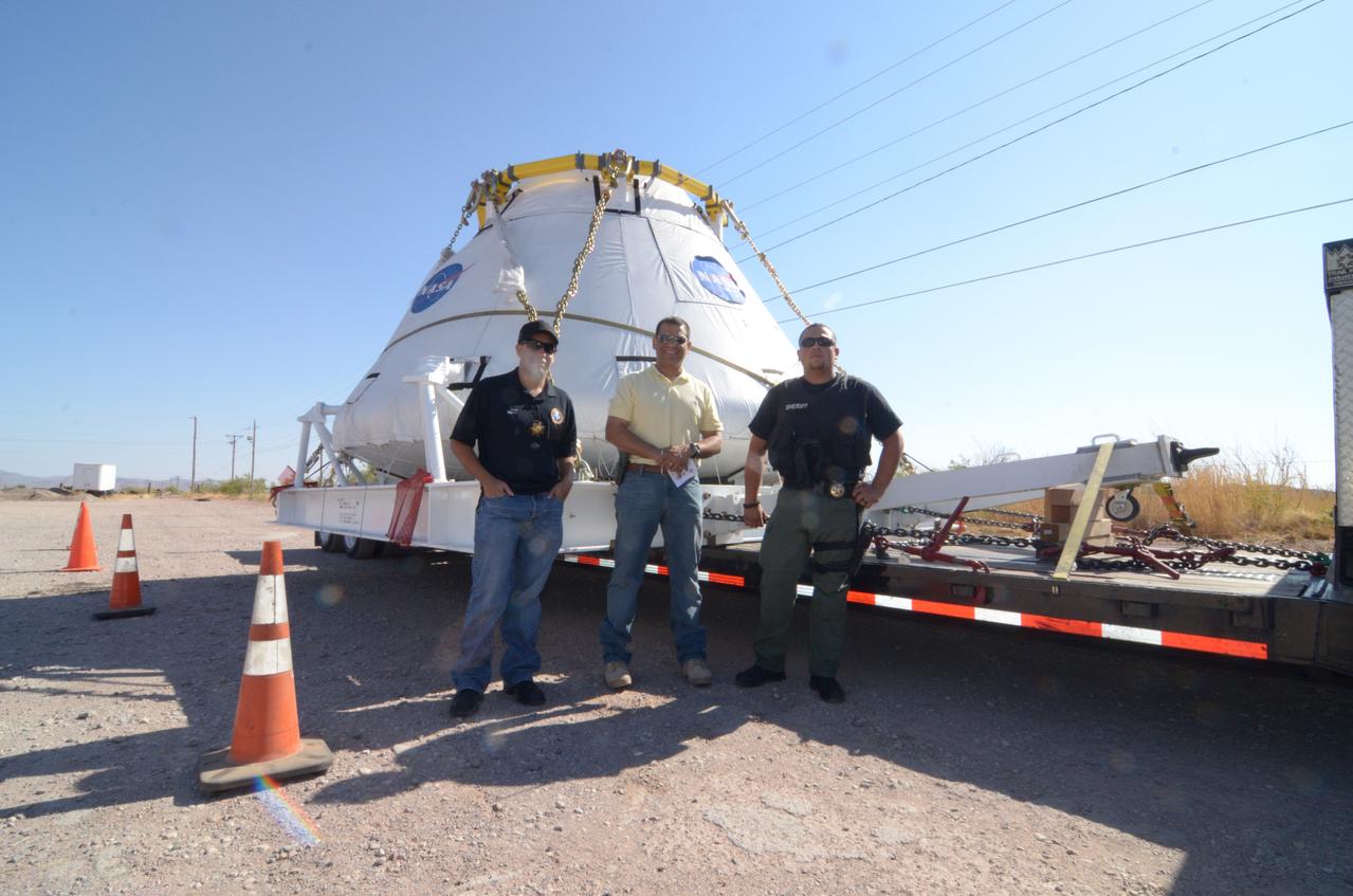 Travelers take a photo with the Orion crew module flown on NASA’s Pad Abort-1 (PA-1) flight test on the road on June 17, 2011. Part of Batch image transfer from Flickr.