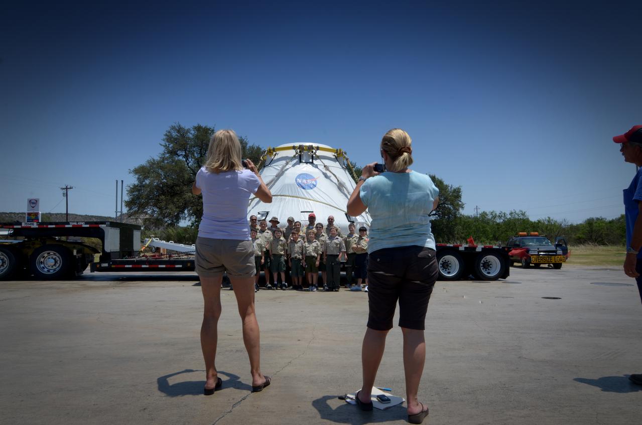 Travelers take a photo with the Orion crew module flown on NASA’s Pad Abort-1 (PA-1) flight test on the road on June 15, 2011. Part of Batch image transfer from Flickr.